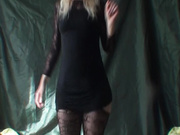 Girl dances in short dress with her pussy showing