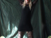 Girl dances in short dress with her pussy showing