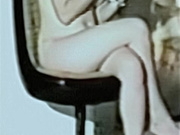 Barbie having a smoke naked in chair legs apart