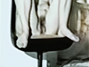 Barbie having a smoke naked in chair legs apart