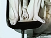 Barbie having a smoke naked in chair legs apart