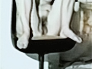 Barbie having a smoke naked in chair legs apart
