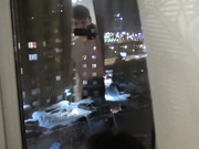 Young couple fuck at window