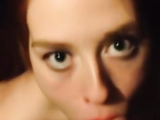 18 Year Old Redhead deepthroats a massive cock