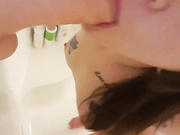 Sucking dildo in the shower