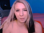 Young Babe Exposes Her Shaved Pussy While Fingering