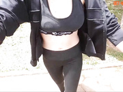 naughty girl in glasses naked in public masturbates in car